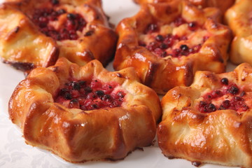 sweet baked cakes with berries