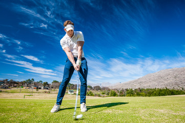 golfer playing a shot on the fairway © danedwards
