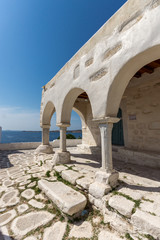 Amazing White chuch and seascape in town of Parakia, Paros island, Cyclades, Greece