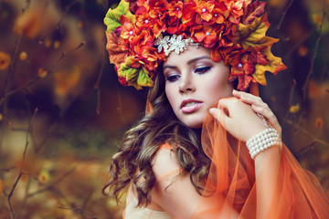 Young Beautiful Woman With Flower Wreath
