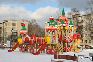 Fototapeta na wymiar A Playground, stylized Kremlin in the yard