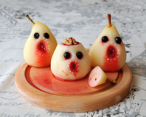 Spooky baked pear monsters or ghosts for Halloween party