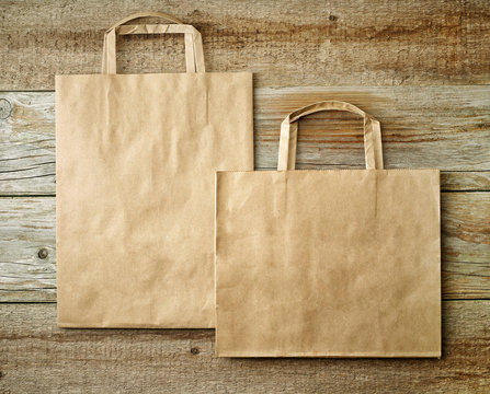 two paper shopping bags