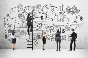 Business team near concrete wall with startup sketch