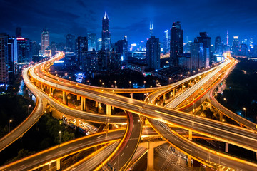 Fototapeta na wymiar Shanghai elevated road junction and interchange overpass at night, Shanghai China