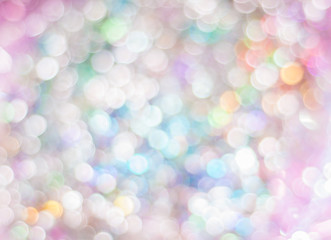 Blurred background with bokeh lights in pastel colours