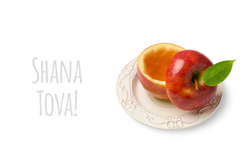 Apple with honey isolated on white background. Jewish New Year holiday Rosh Hashanah concept