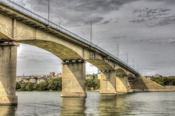 Naklejka premium the bridge over the river