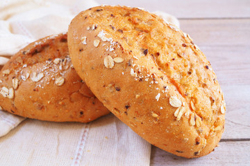 Close up of multi grain bread on a wooden table.