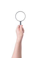 Female hand with magnifying glass isolated on white