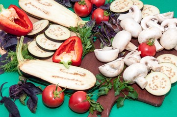 Champignon and fresh vegetables on a kitchen table