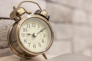 Retro alarm clock on table