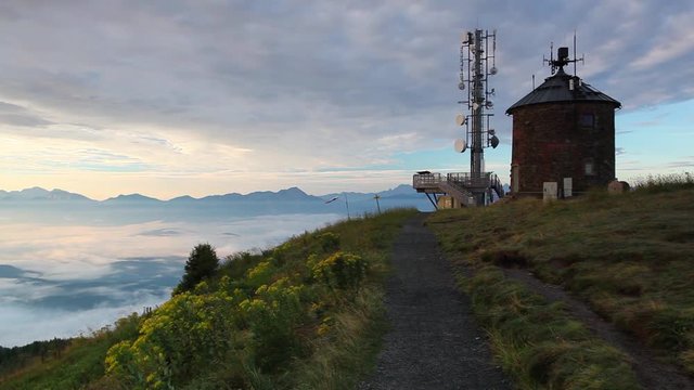 Communications station and amazing morning in Gerlitzen Apls in Austria.View of the mountains in Slovenia.