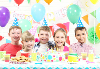 Happy kids having fun at birthday party
