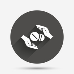 Medical insurance sign. Hand holds pills.