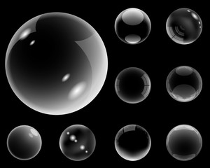 Transparent bubbles set in realistic style on black background vector illustration