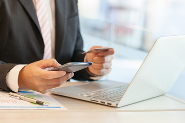 Businessman doing online banking.