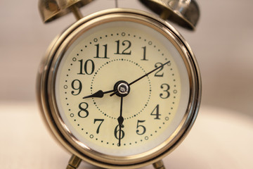 Retro alarm clock on table