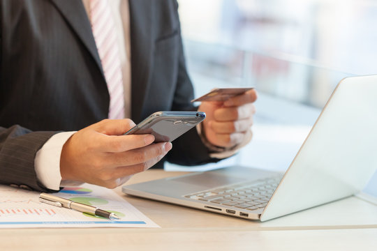 Businessman doing online banking.