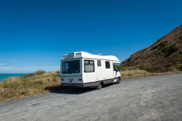 Obraz premium Motorhome or campervan parking by the coast of Kaikoura in South