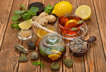 Fresh tea in glass teapot