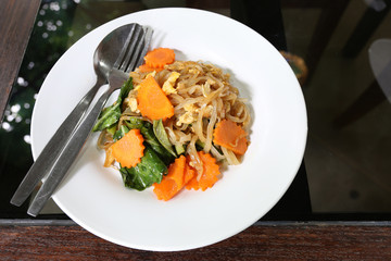 Fried Noodle on white dish.