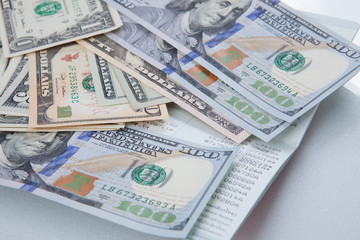 Statement of account with the money on top / reviews the accounting benefits across many euro banknotes