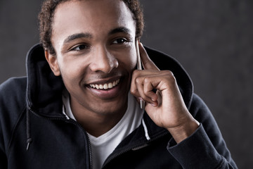 Smiling African American man on phone