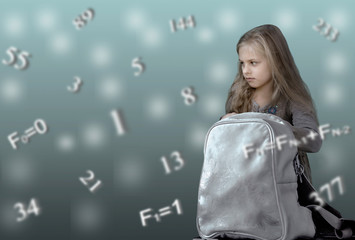 Children and formulas. Fibonacci. cute little girl with school backpack on the background of...