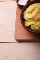 VareniksCloseup.with salt- national ukrainian cuisine. clay plat