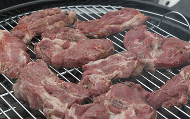 Raw Meat on the grill.