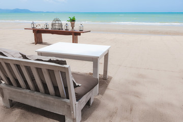 Sofa and table on the beach