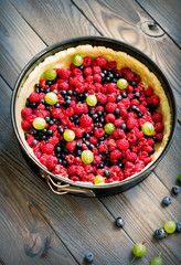 Wild berry pie with raspberries and blueberries