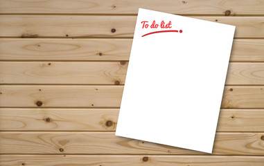 To do list paper put on wooden table,for add your text ,graphic editor