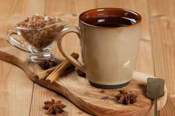 Cup Of Tea Or Coffee. Spices. Olive Tree Board. Wooden Table.