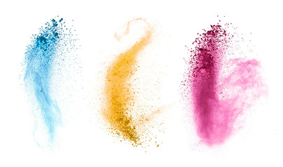 Explosions of colored powder on white background