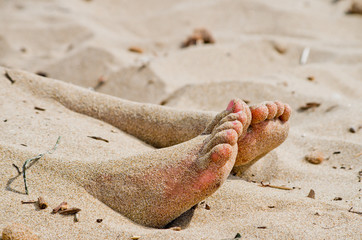 under the sun two feet out from the hot sand