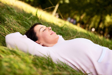 young woman relaxing in the park