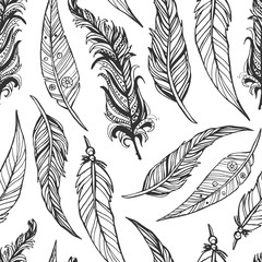 Hand drawn doodle feathers seamless pattern
