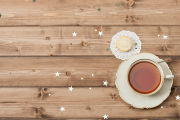 Cup Of Tea. Mince Pie. Shining Stars. Wooden Background With Cop
