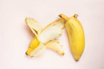 Thick bananas taste like apples on pink background