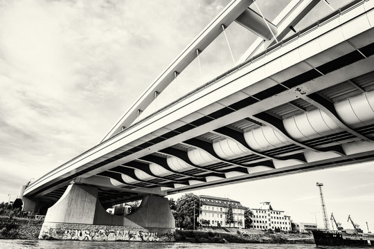 Fototapeta Modern Apollo bridge in Bratislava, Slovakia, black and white