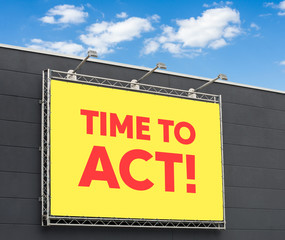 Time to act written on a billboard