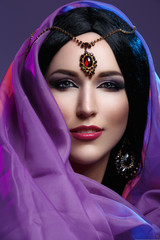 Beautiful girl with arabic makeup