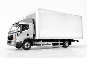 Commercial cargo delivery truck with blank white trailer. Generic, brandless design.