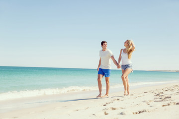 Romantic young couple on the beach