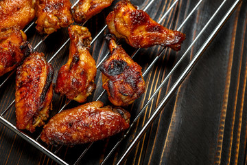 Grilled chicken wings on the grill
