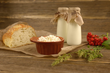 Natural dairy products in a rustic style on the wooden background