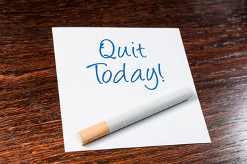 Quit Smoking Today Reminder With Cigarette On Wooden Shelf