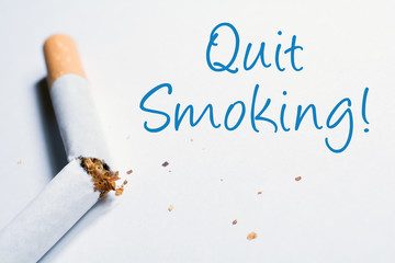 Quit Smoking Reminder With Broken Cigarette In Whitebox